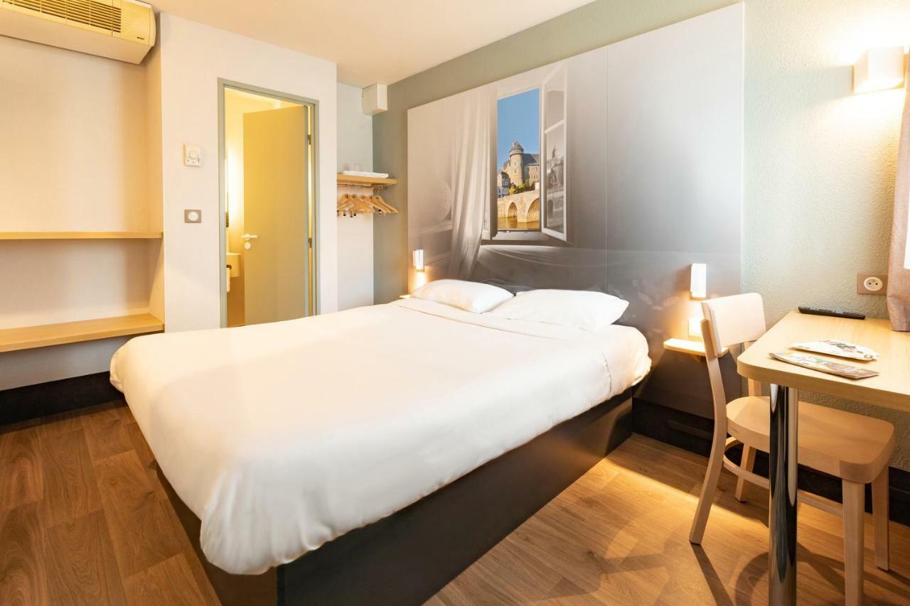 B&B Hotel Laval Change Экстерьер фото