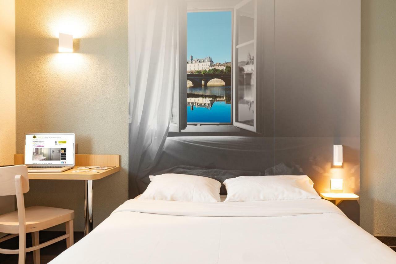 B&B Hotel Laval Change Экстерьер фото