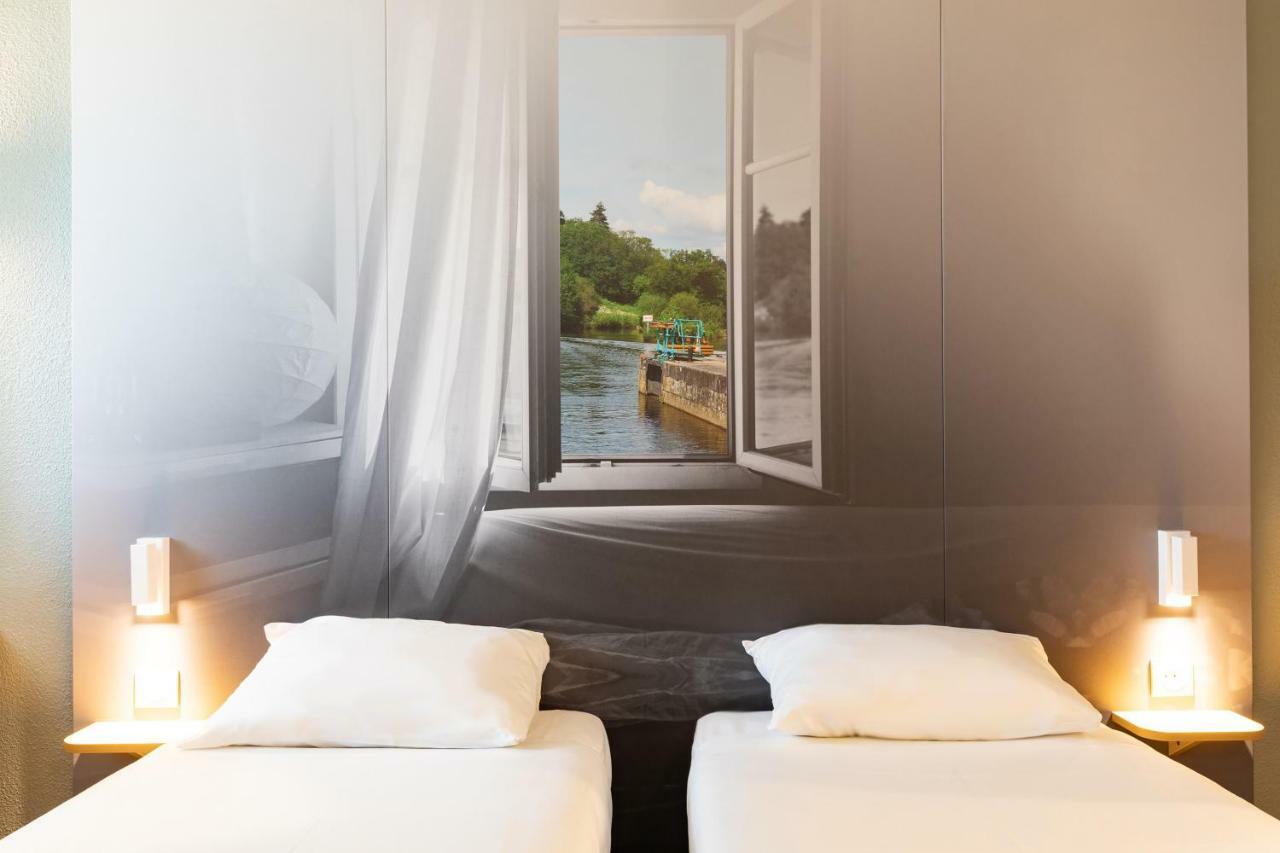 B&B Hotel Laval Change Экстерьер фото
